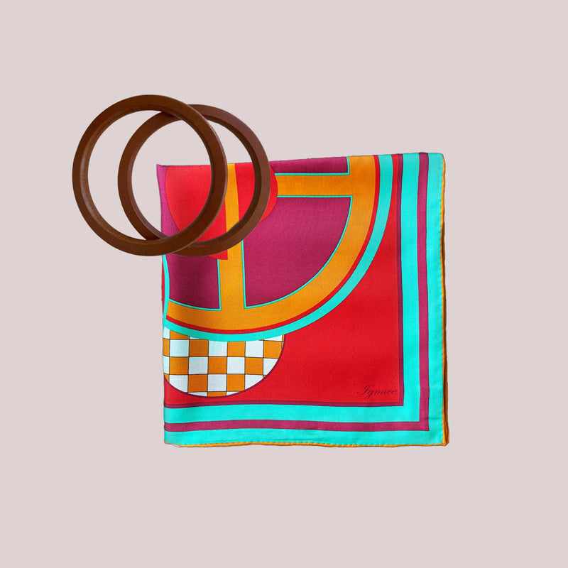 Turn your scarf into a hand bag
